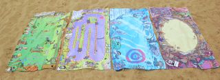 Illustration for article titled Beach Towel Board Games You Play With Discarded Bottle Caps